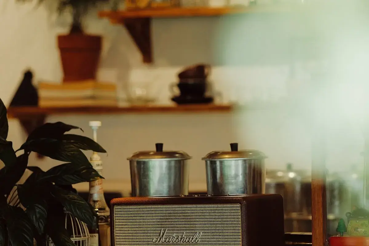 A speaker in a cozy coffee shop — playing music to customers counts as a public performance